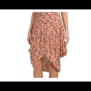 Free People NWOT asymmetrical hem skirt. Size 2.